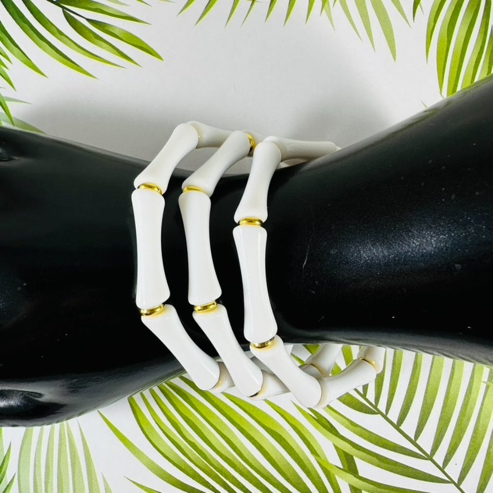 Set of 3 retro tiki bamboo look stretch bracelets in glossy white and go…